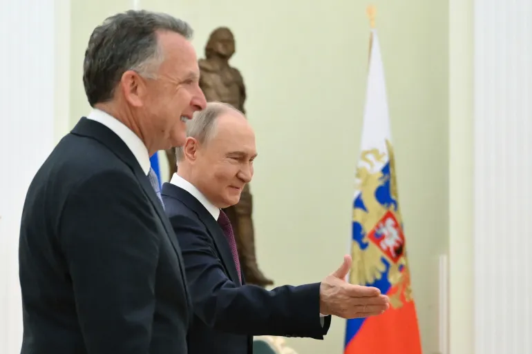 Russian President Vladimir Putin, centre , welcomes U.S. President Donald Trump's special envoy Steve Witkoff to their talks at the Kremlin in Moscow, Russia, Friday, April 25, 2025. (Kristina Kormilitsyna, Sputnik, Kremlin Pool Photo via AP)