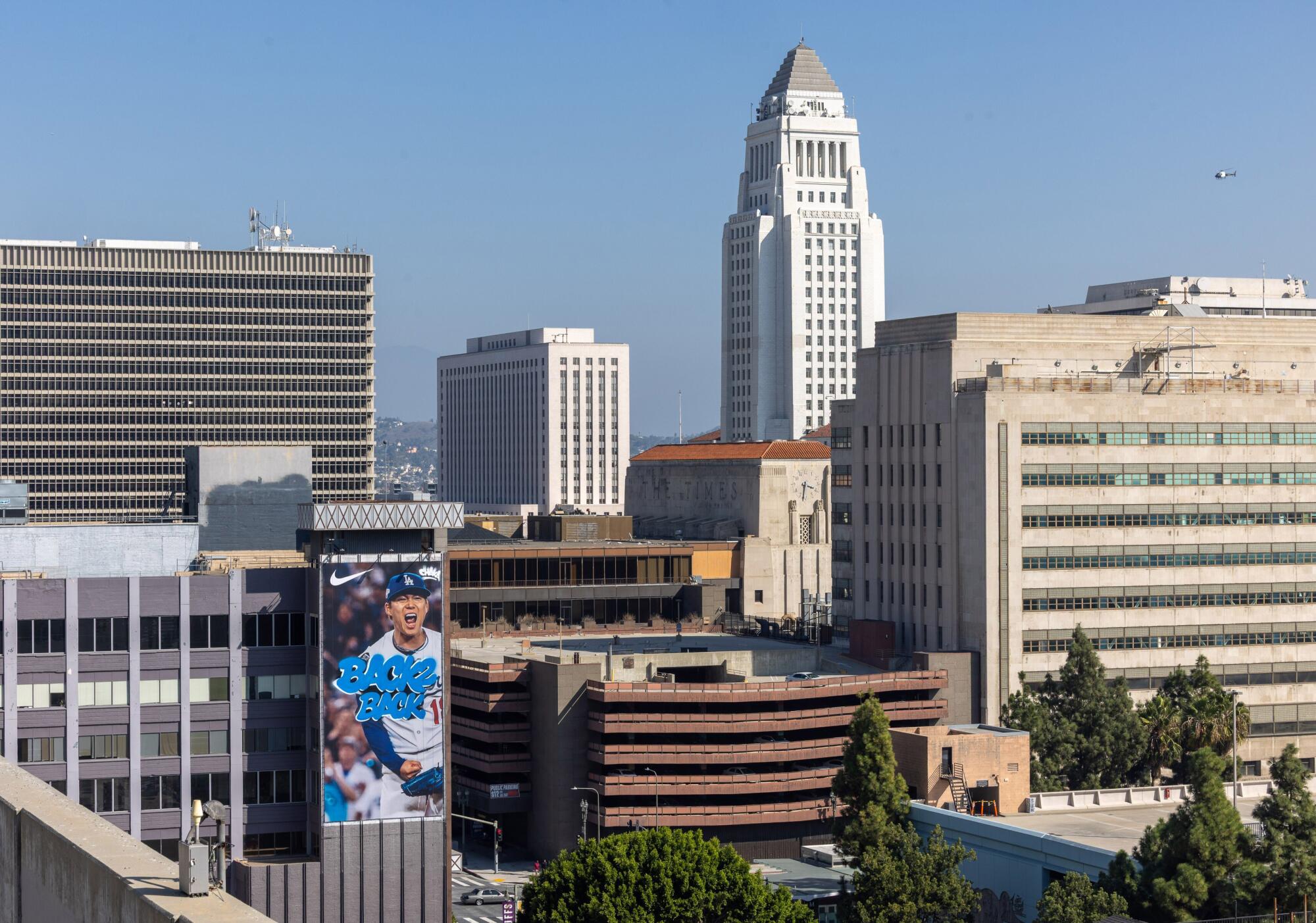 A mural of Dodgers pitcher Yoshinobu Yamamoto is a temporary addition to the downtown Los Angeles skyline.