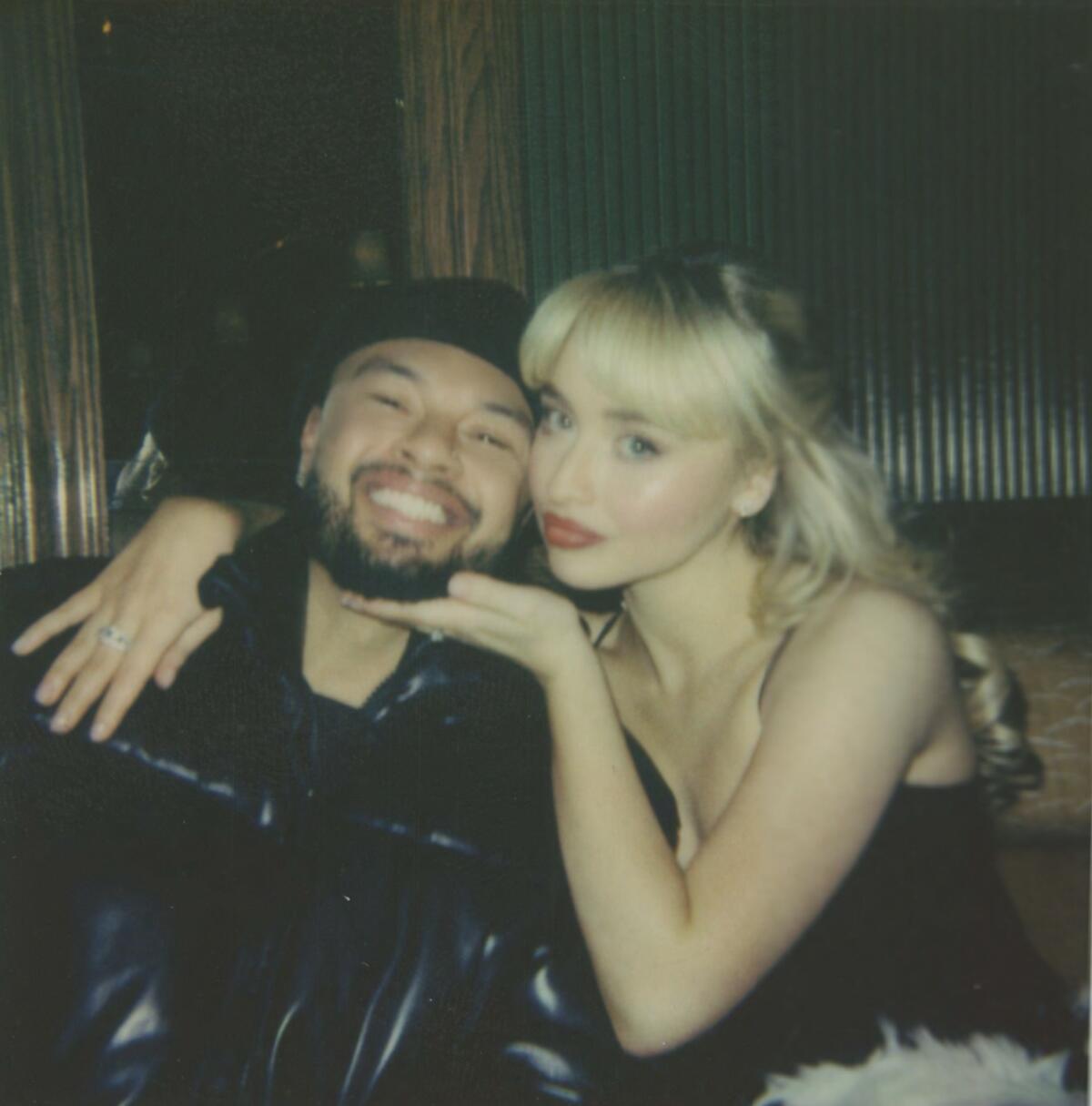 Alfredo Flores smiling with Sabrina Carpenter