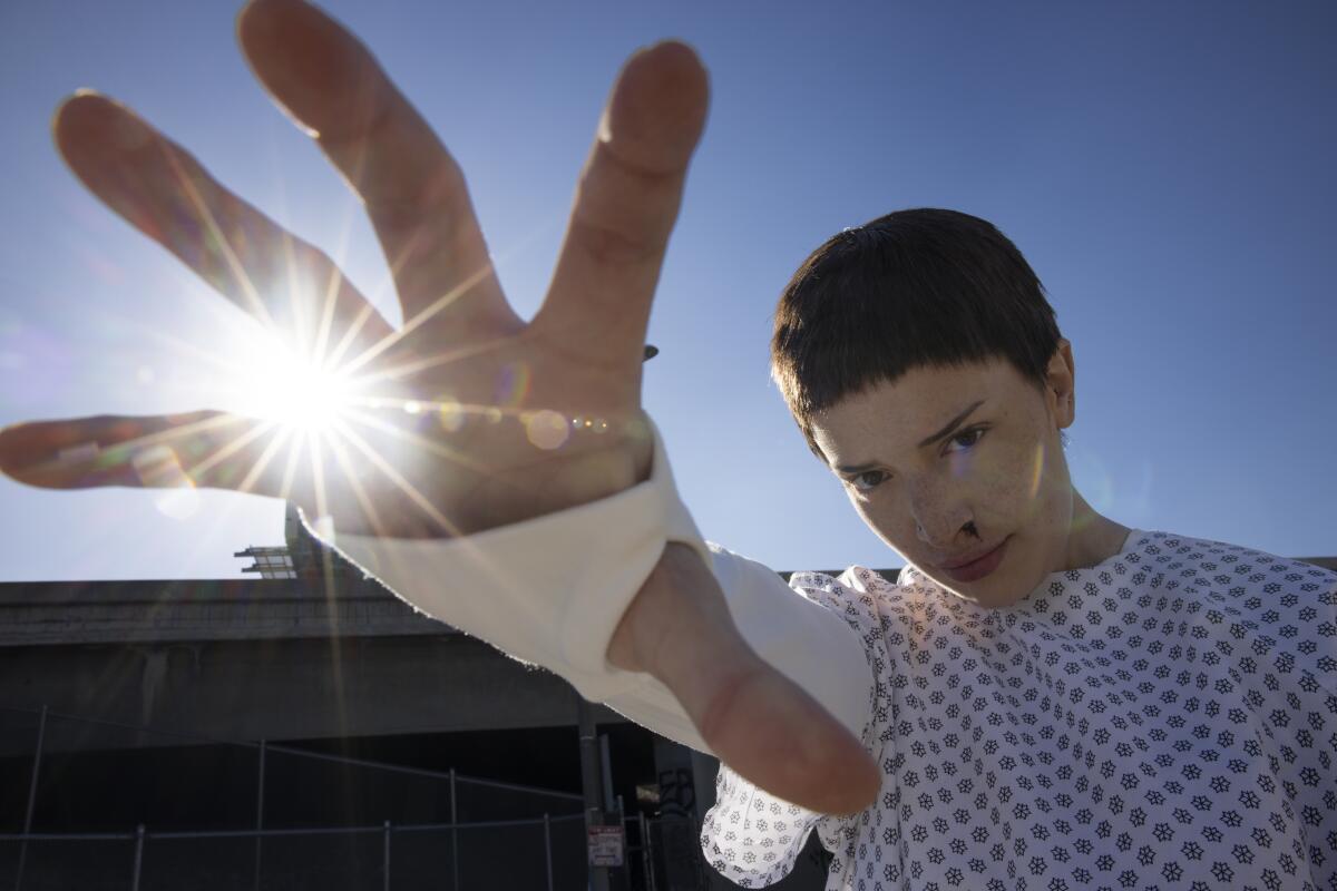 Rayna Lynn Chacon, 26, from Los Angeles dresses as Eleven from "Stranger Things" during the Netflix x CicLAvia event.