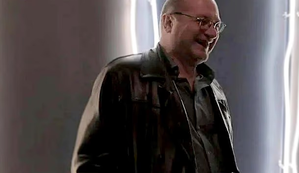 Dan McGrath, Emmy-winning writer and producer, in a black leather jacket.