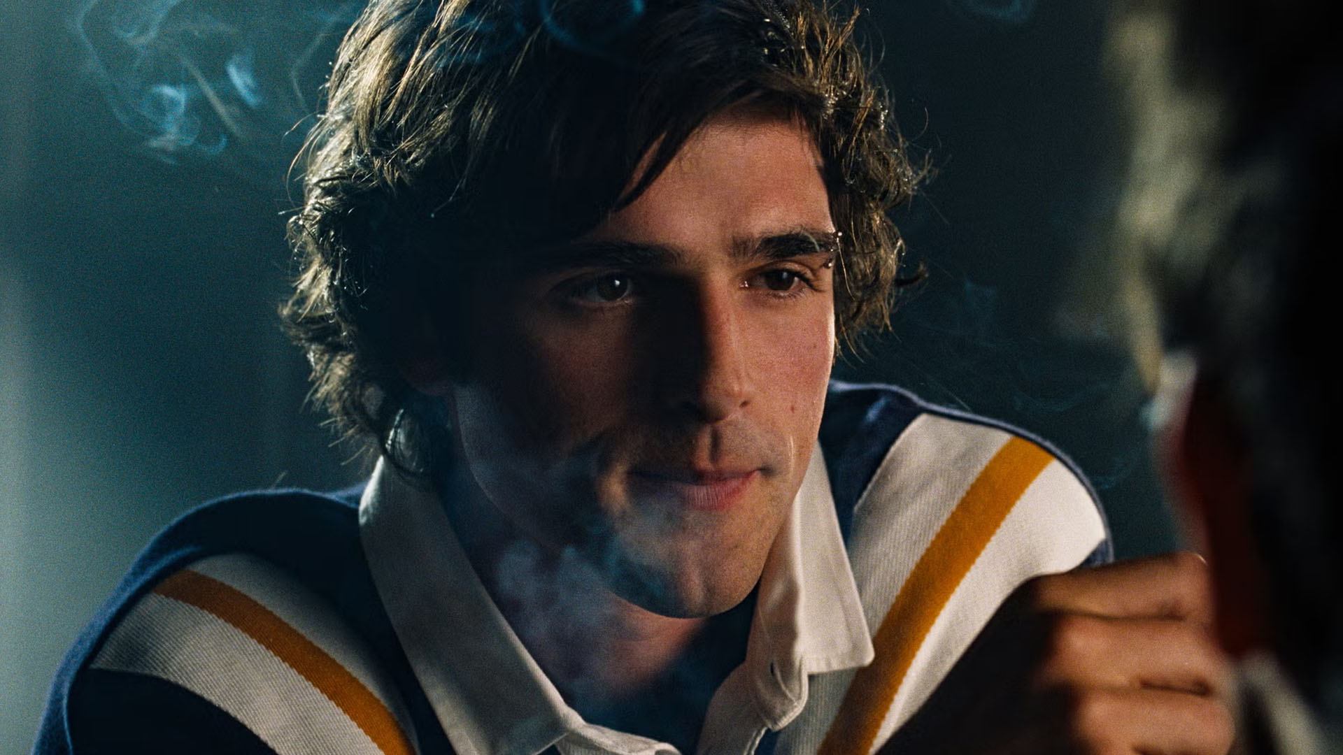 Jacob Elordi as Felix Catton in Saltburn, smoking.