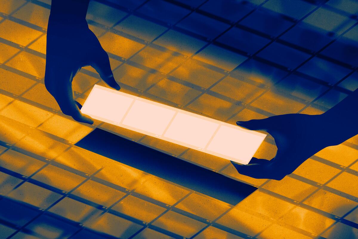 An illustration of two hands fitting a missing piece into an arrangement of squares.
