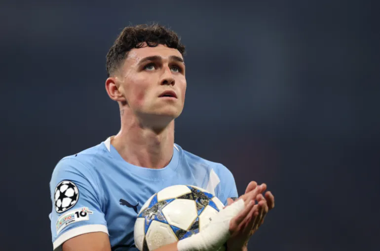 MANCHESTER, ENGLAND - NOVEMBER 05: Phil Foden of Manchester City looks on during the UEFA Champions League 2025/26 League Phase MD4 match between Manchester City and Borussia Dortmund at City of Manchester Stadium on November 05, 2025 in Manchester, England. (Photo by Carl Recine/Getty Images)