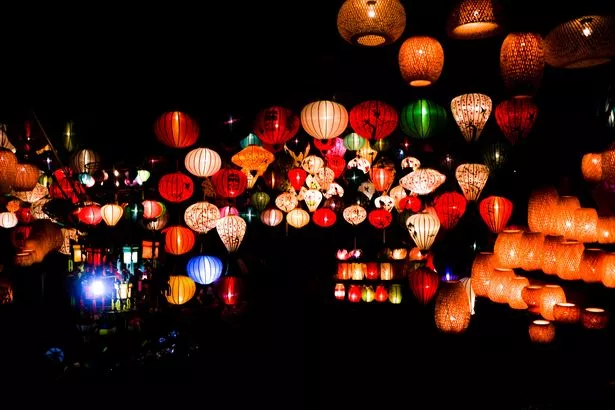 The illuminated lanterns light up Hoi An, Vietnam.