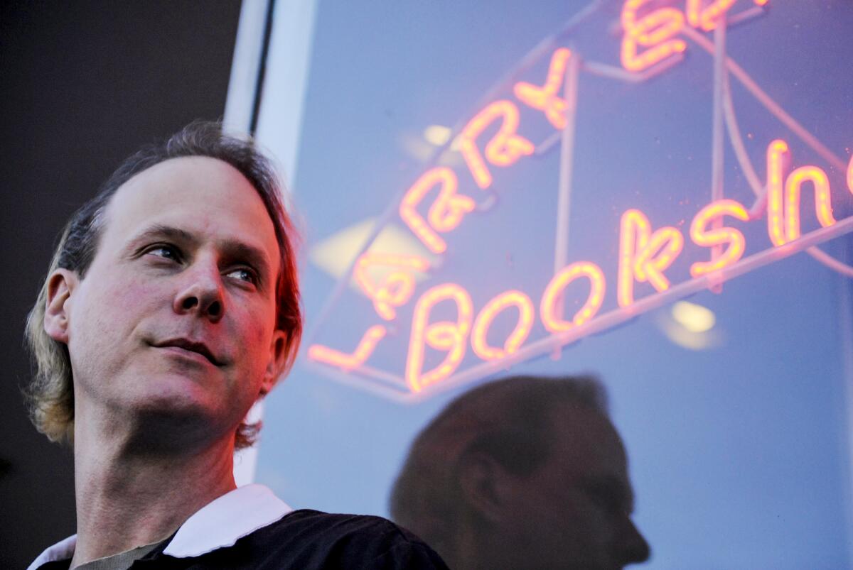 Jeff Mantor in front of Larry Edmunds bookshop in 2011