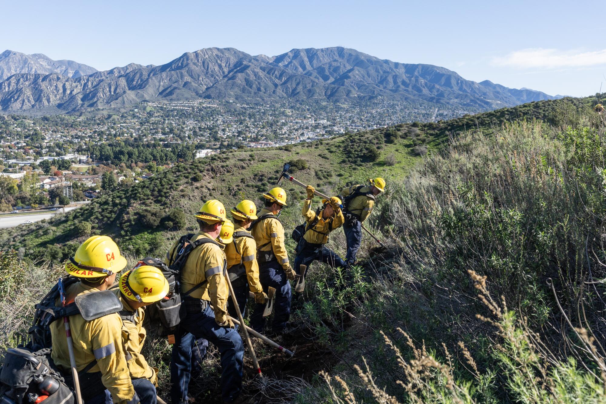 Hand crew members work outside