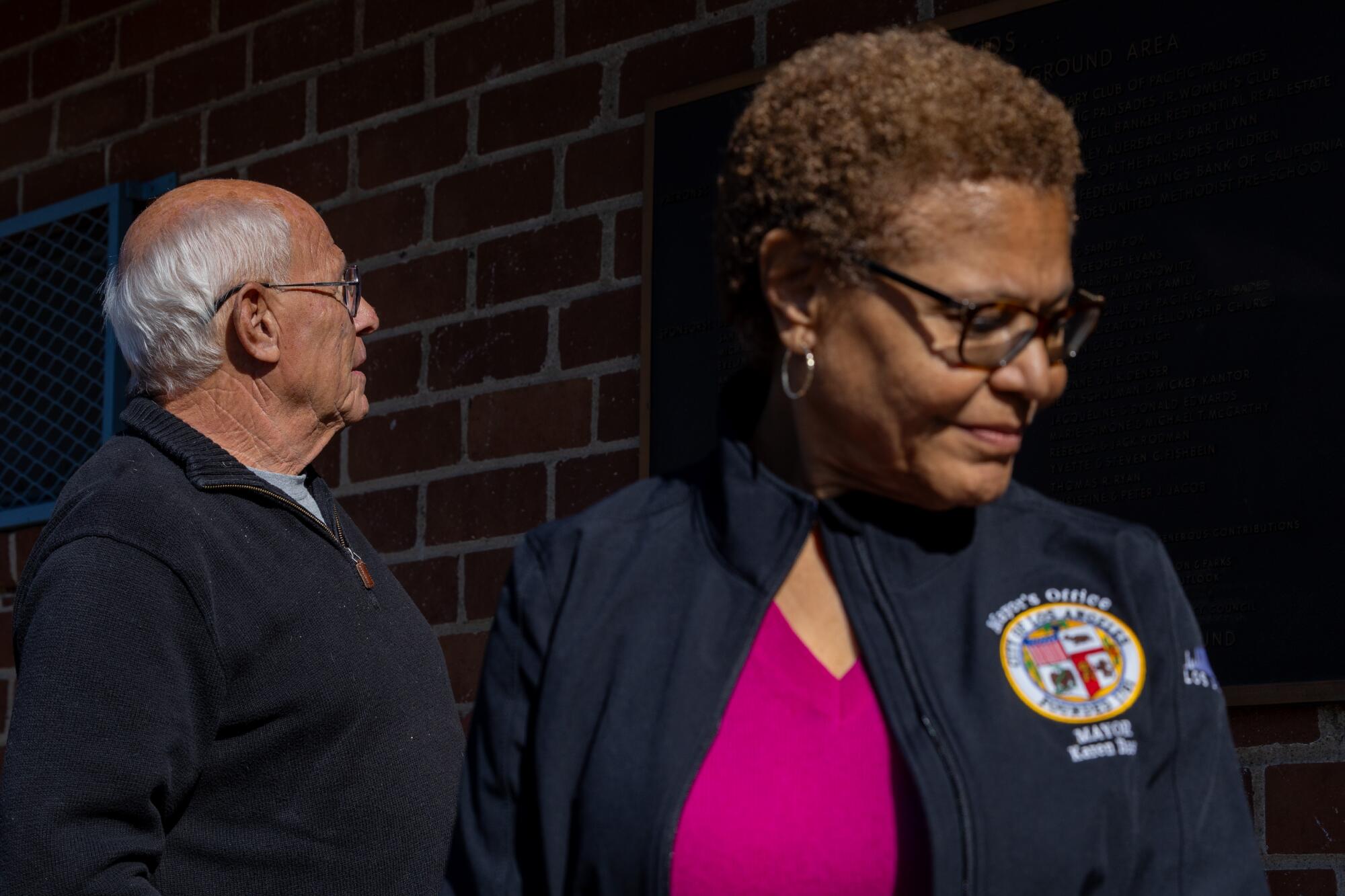 Mayor Karen Bass, right, and her disaster recovery chief, Steve Soboroff, left, media during a news conference