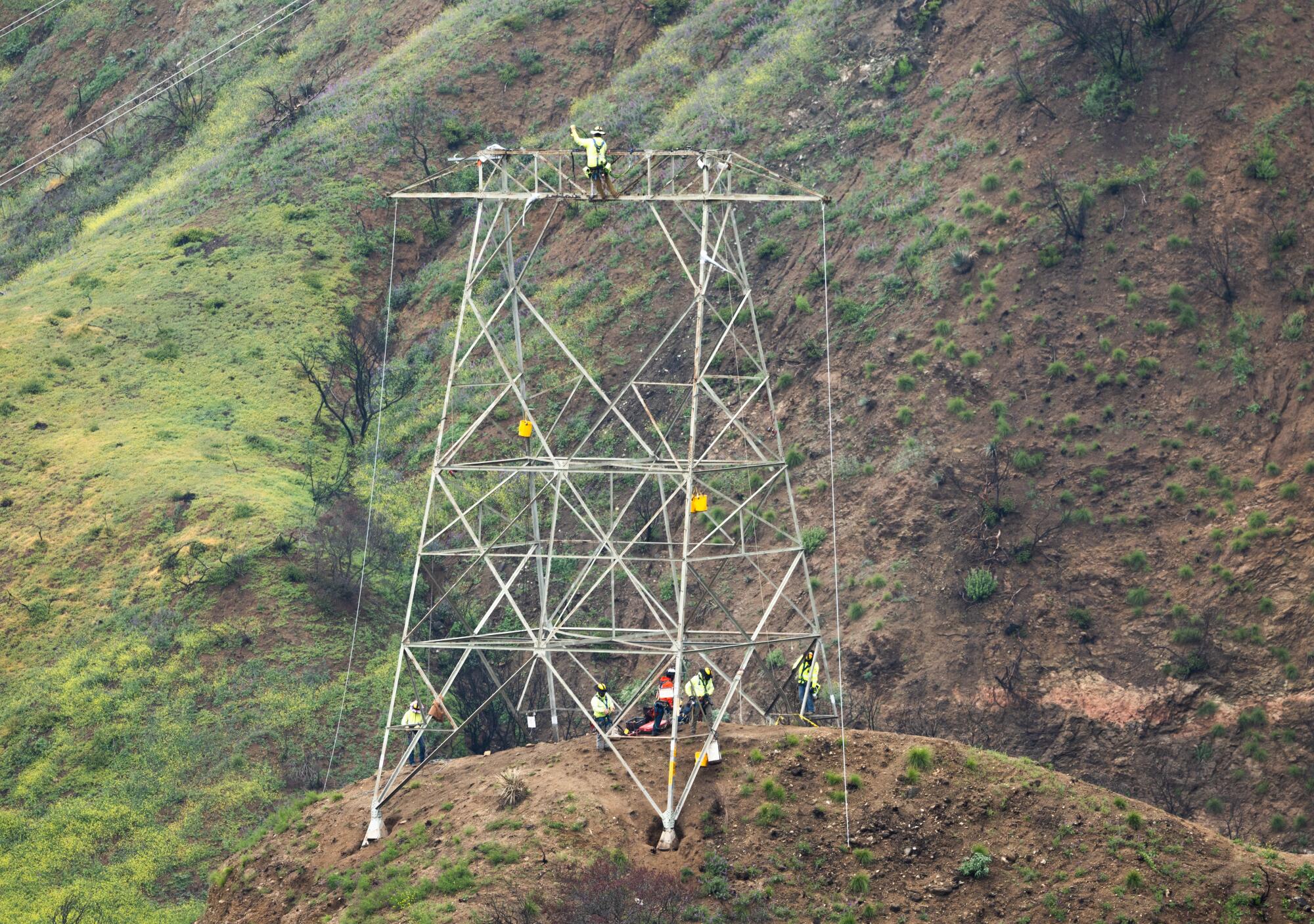 Work crew dismantles a section of Southern California Edison's tower 208