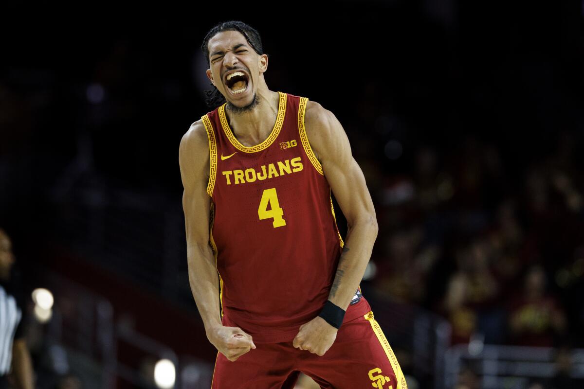 Chad Baker-Mazara reacts after scoring on an offensive rebound in the first half.