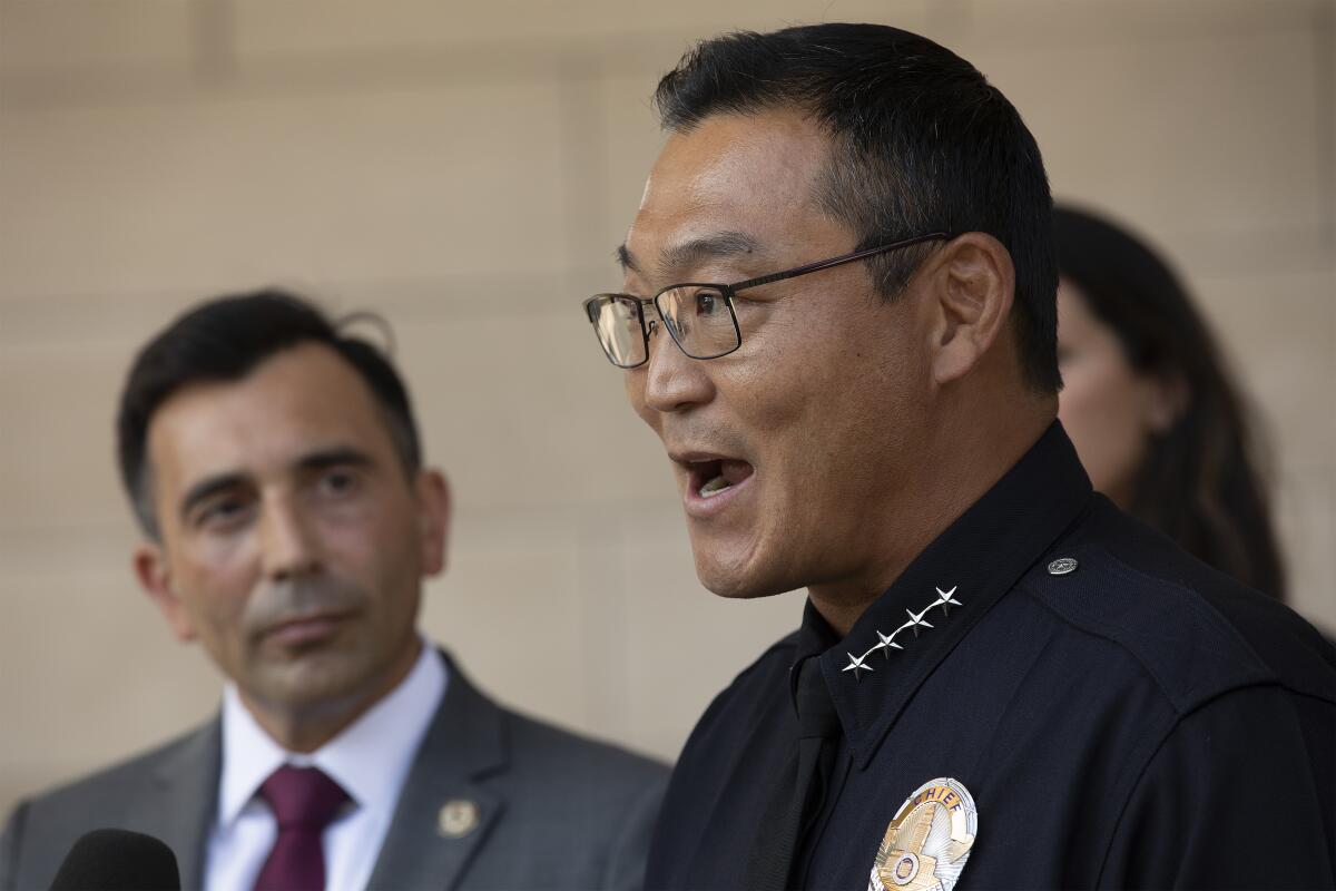  Dominic Choi speaks at a news conference 