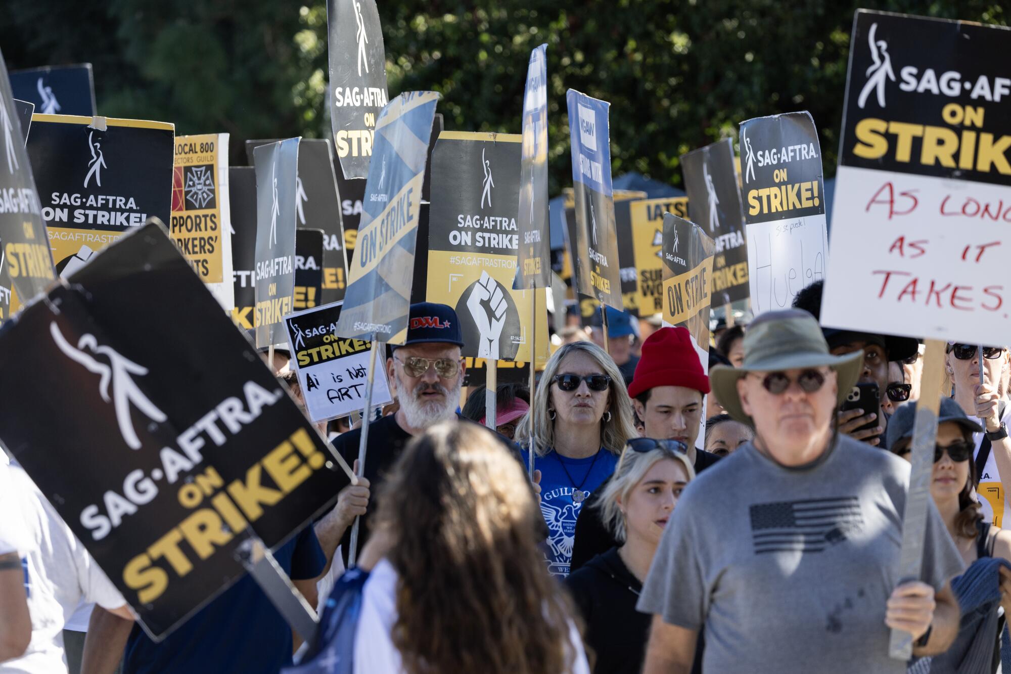 SAG-AFTRA members march in one "Unity Picket" on strike day 111 at Walt Disney Studios in Burbank on Nov. 1, 2023.