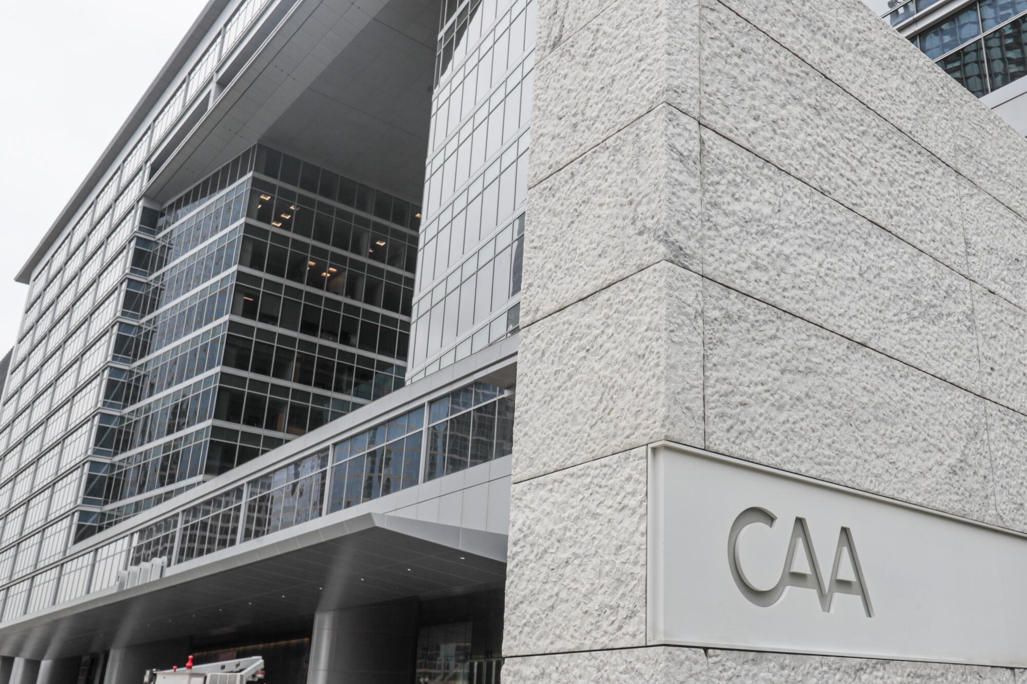 A large gray, glassy building stands in Los Angeles.