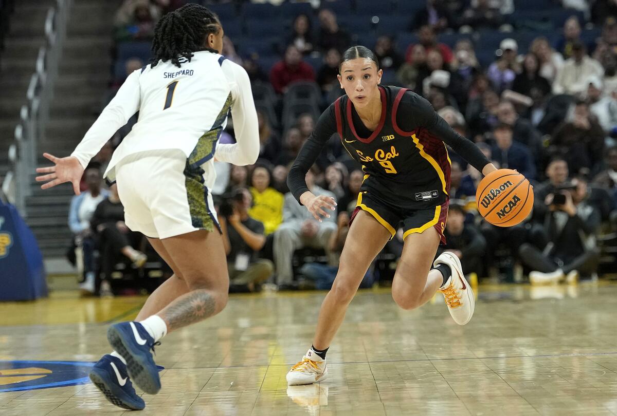 USC’s Jazzy Davidson controls the ball in front of California’s Mjracle Sheppard.