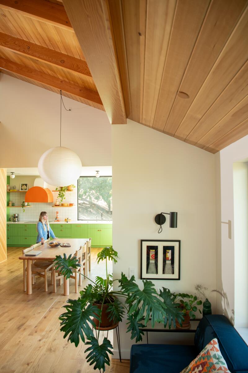 Lindsay Sheron stands inside her dining room in Mount Washington.