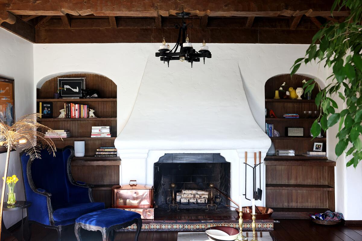 Caitlin Villarreal, her cat Zuse, and their Hollywood penthouse in the Whitley Heights.