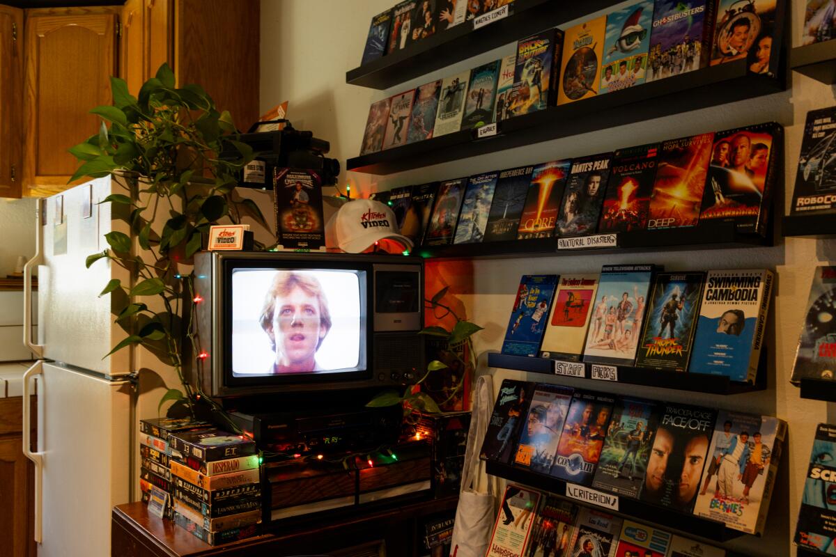 Filmmaker Chris Rose's VHS tapes are displayed in the kitchen of his Silver Lake apartment.
