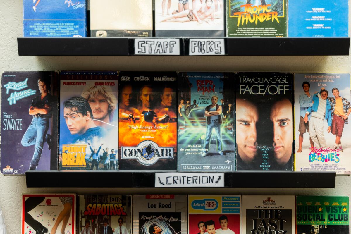 Filmmaker Chris Rose's VHS tapes are displayed in the kitchen of his Silver Lake apartment. 