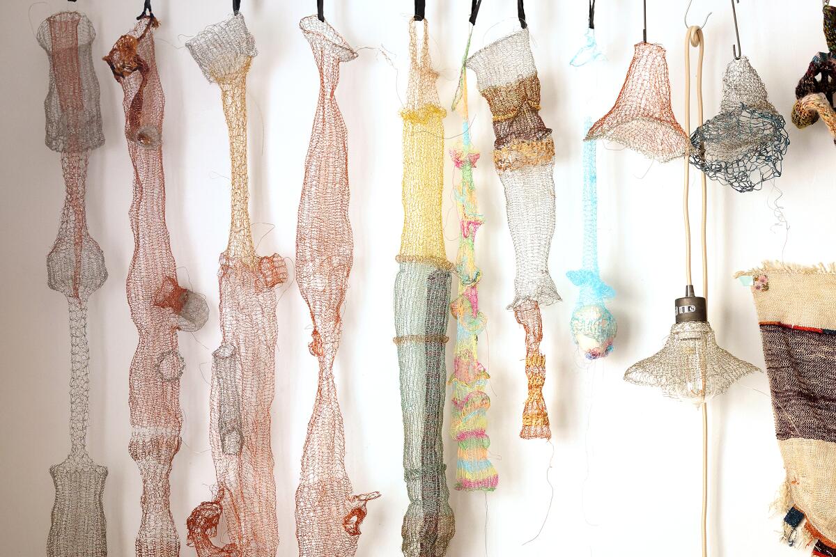 Debra Weiss' apartment in Mid-Wilshire with colorful hangings.