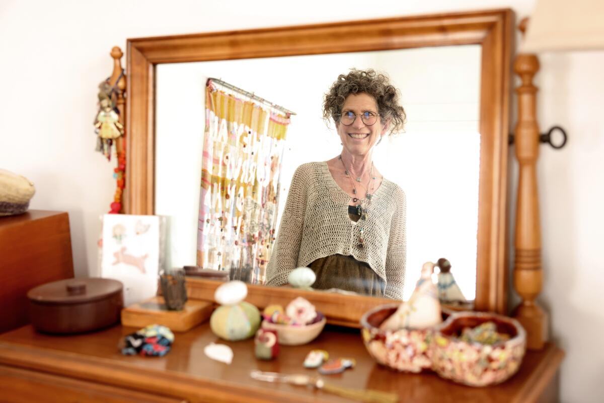 Artist Debra Weiss is photographed at her apartment in Mid-Wilshire.