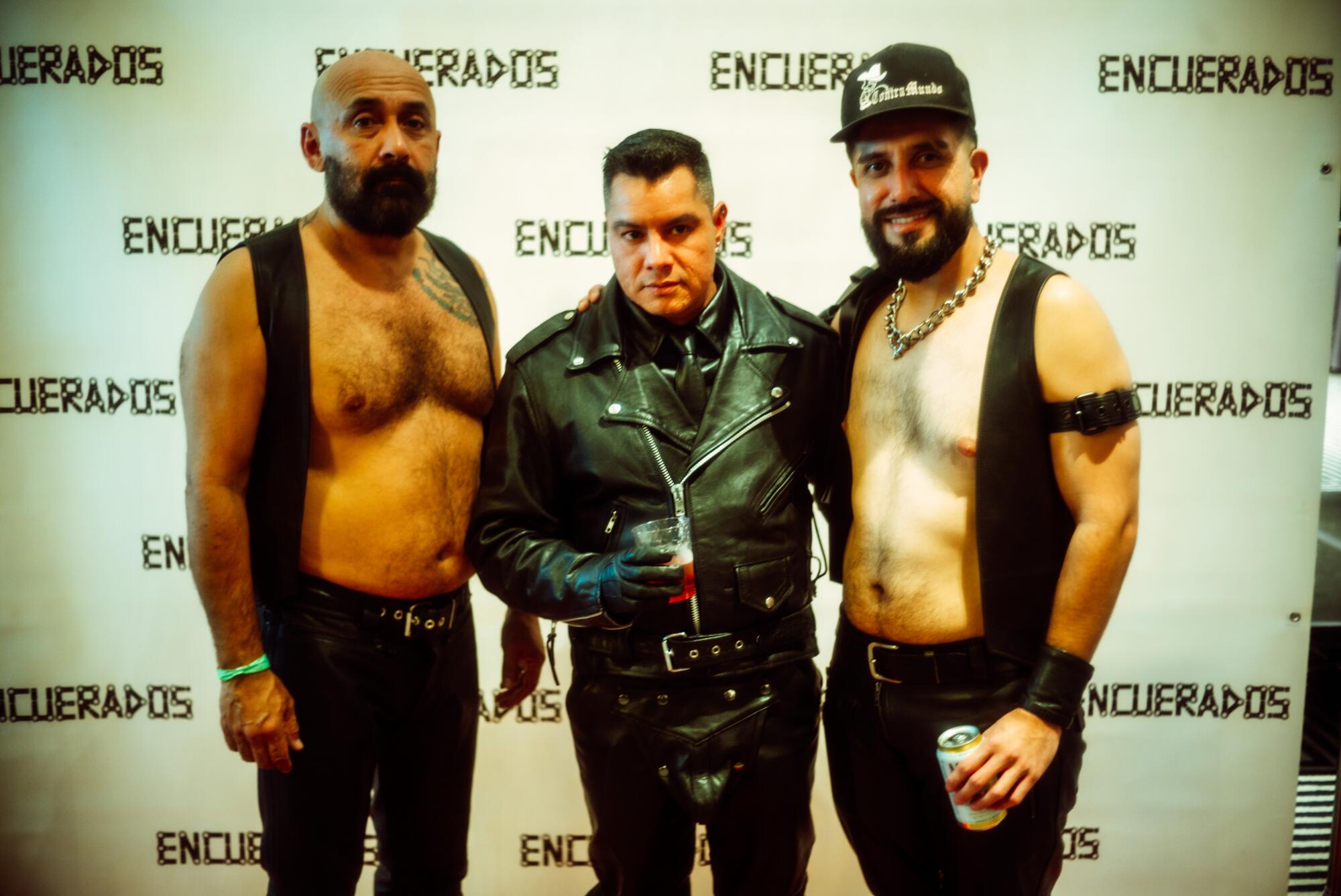 Latinos in leather pose ahead of the "Encuerados" screening during the CLAW L.A. convention on November 28th. 