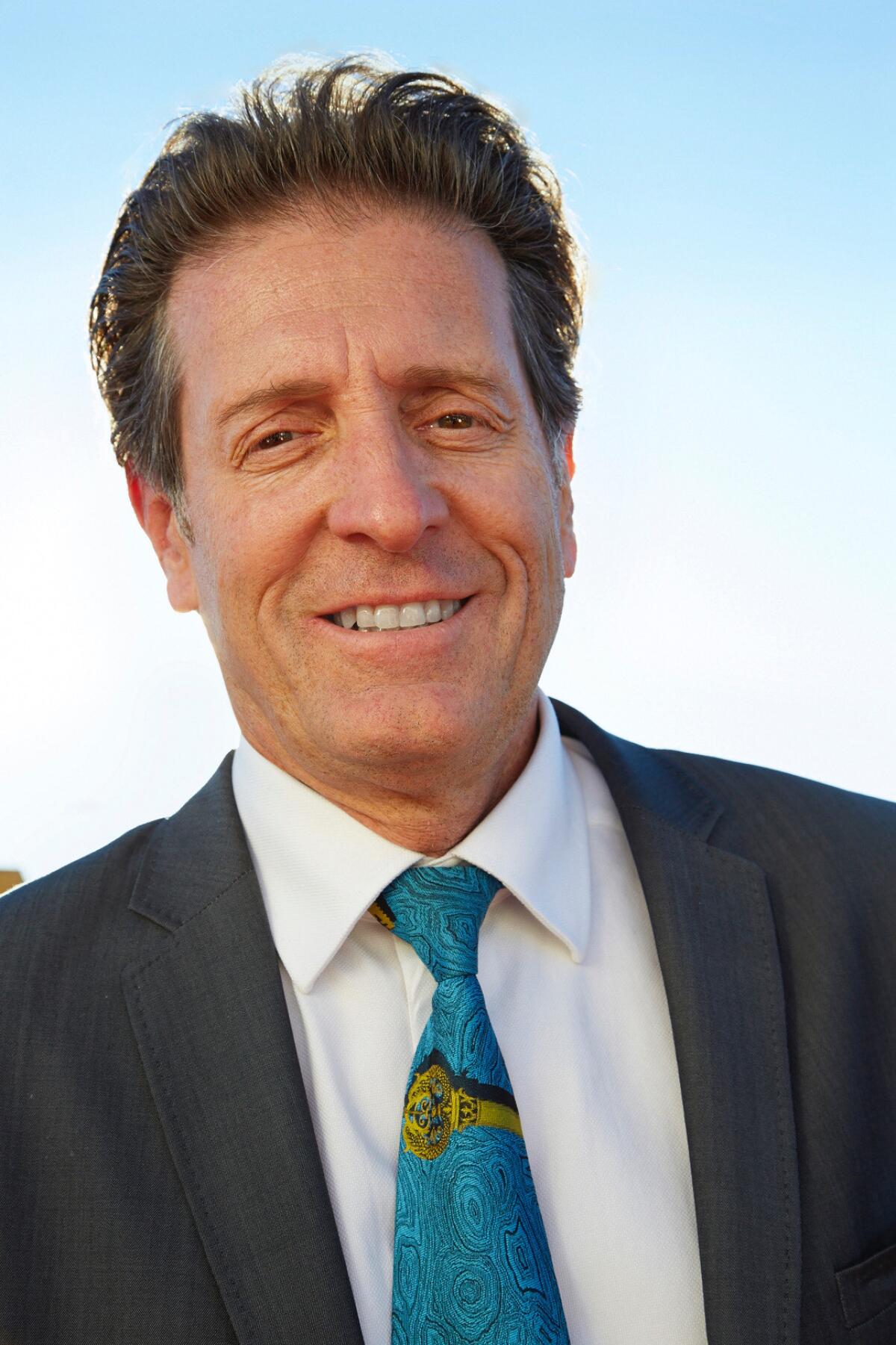 Eddie Sotto in an aqua tie.