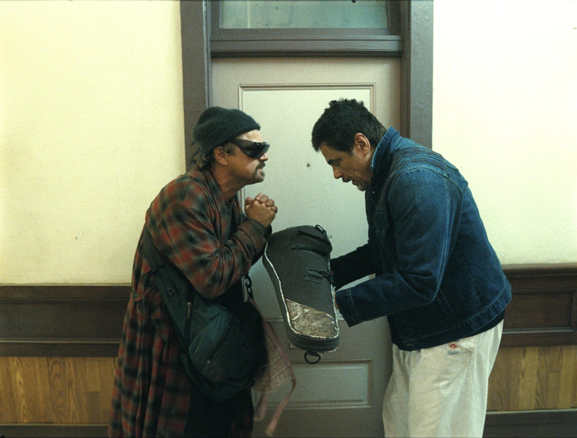 LEONARDO DI CAPRIO and BENICIO DEL TORO in "One Battle After Another."