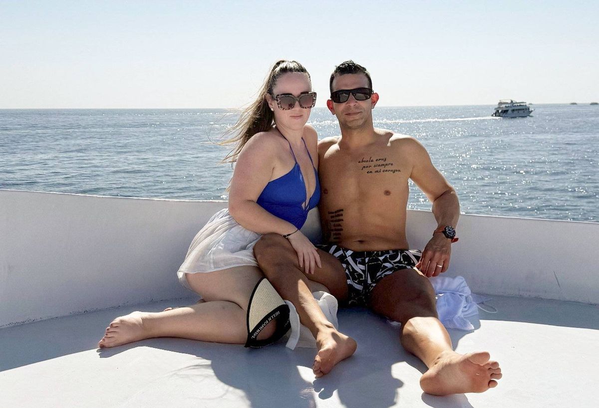 Shelley Quijada with her husband on a boat