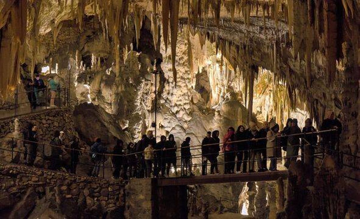 view of rock formation inside cave in postonja slovenia (stalagmite and stalactite formations inside below ground)