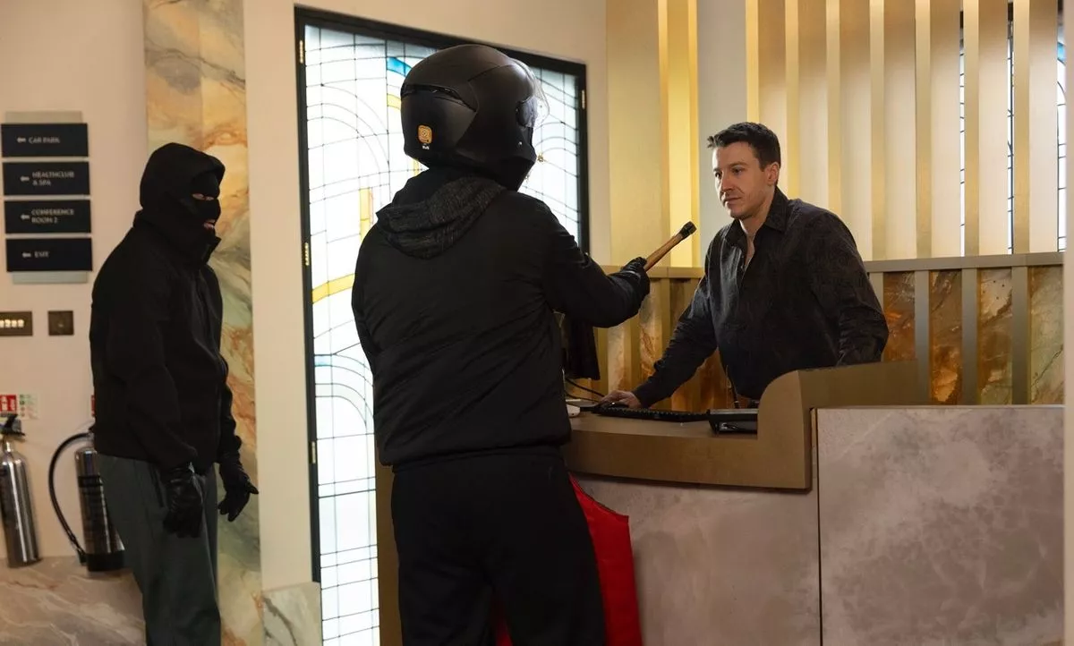 Ryan faces danger when two masked robbers approach him 