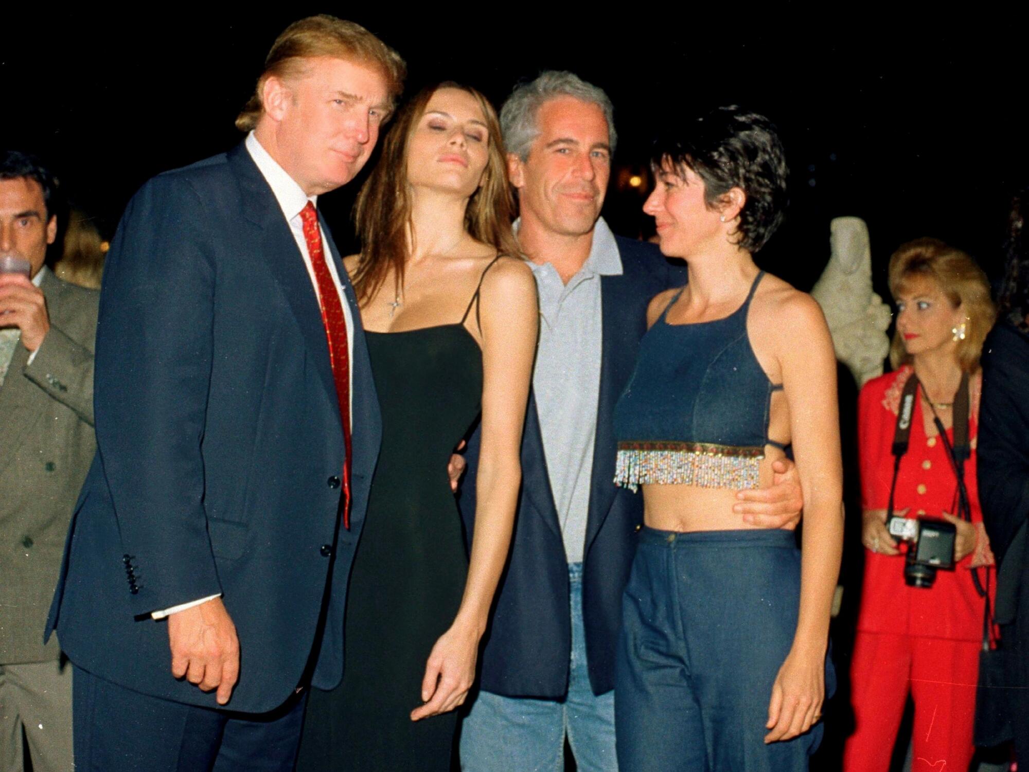 Donald Trump in 2000 with his then-girlfriend and future wife, Melania Knauss, Jeffrey Epstein and Ghislaine Maxwell.