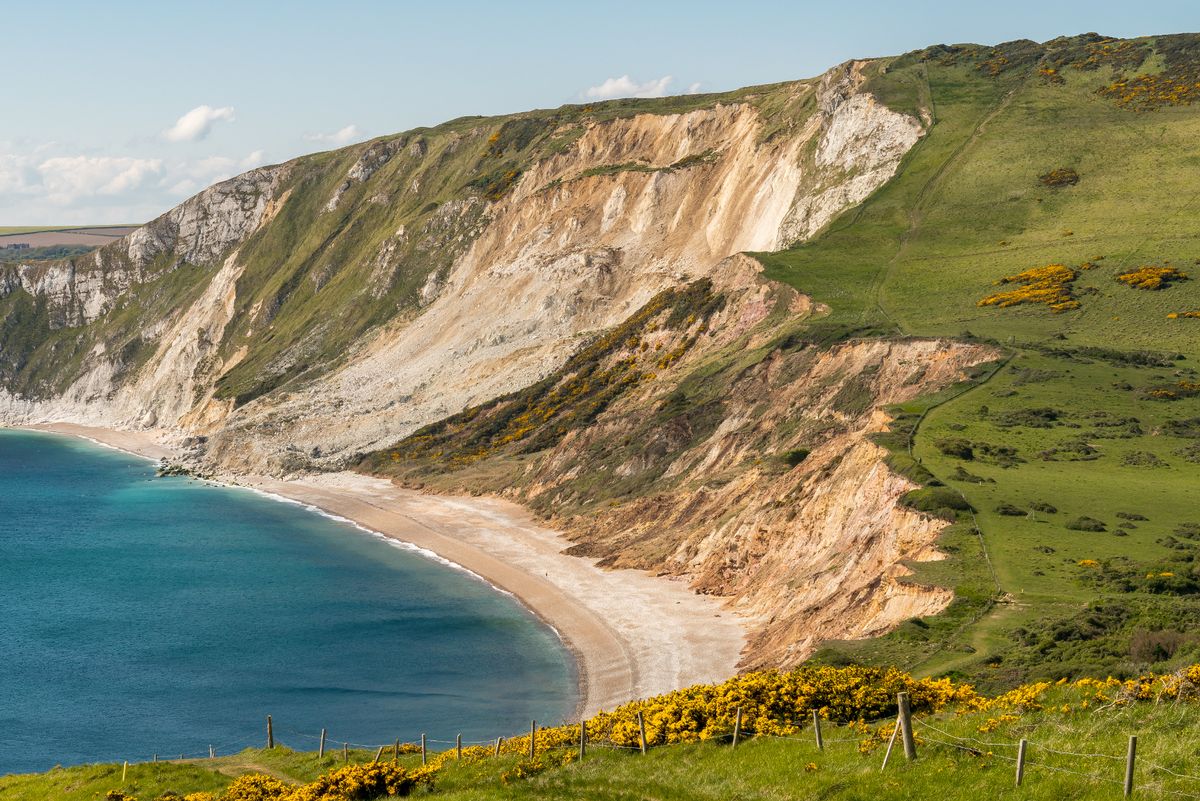 Walking on the South West Coast Path, looking at Worbarrow Bay, near Tyneham, Jurassic Coast, Dorset, 