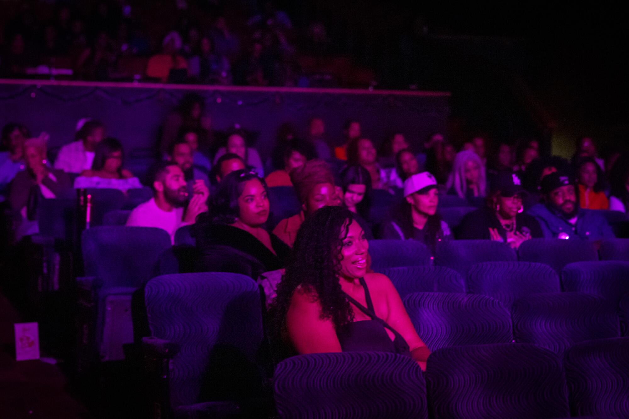 "Waiting to Exhale" attendees react during a screening. 
