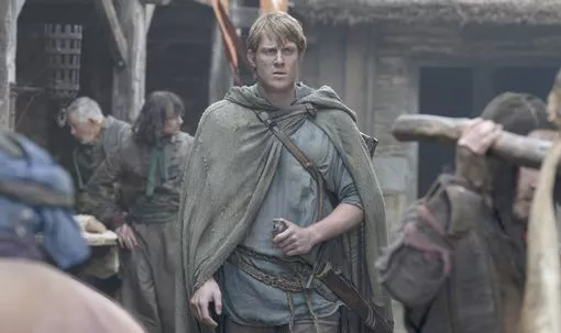 A man walks through a market