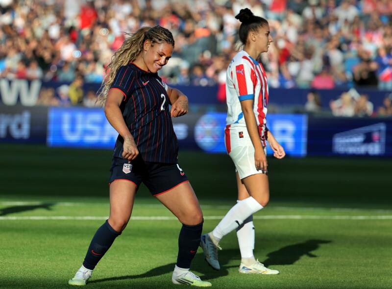 Carson, CA - January 24: The U.S. Women's National Team (USWNT) midfielder Trinity Rodman, left, celebrates her goal as Paraguay defender Fiorella Martinez walks by in the second half at Dignity Health Sports Park in Carson Saturday, Jan. 24, 2026. (Allen J. Schaben / Los Angeles Times)