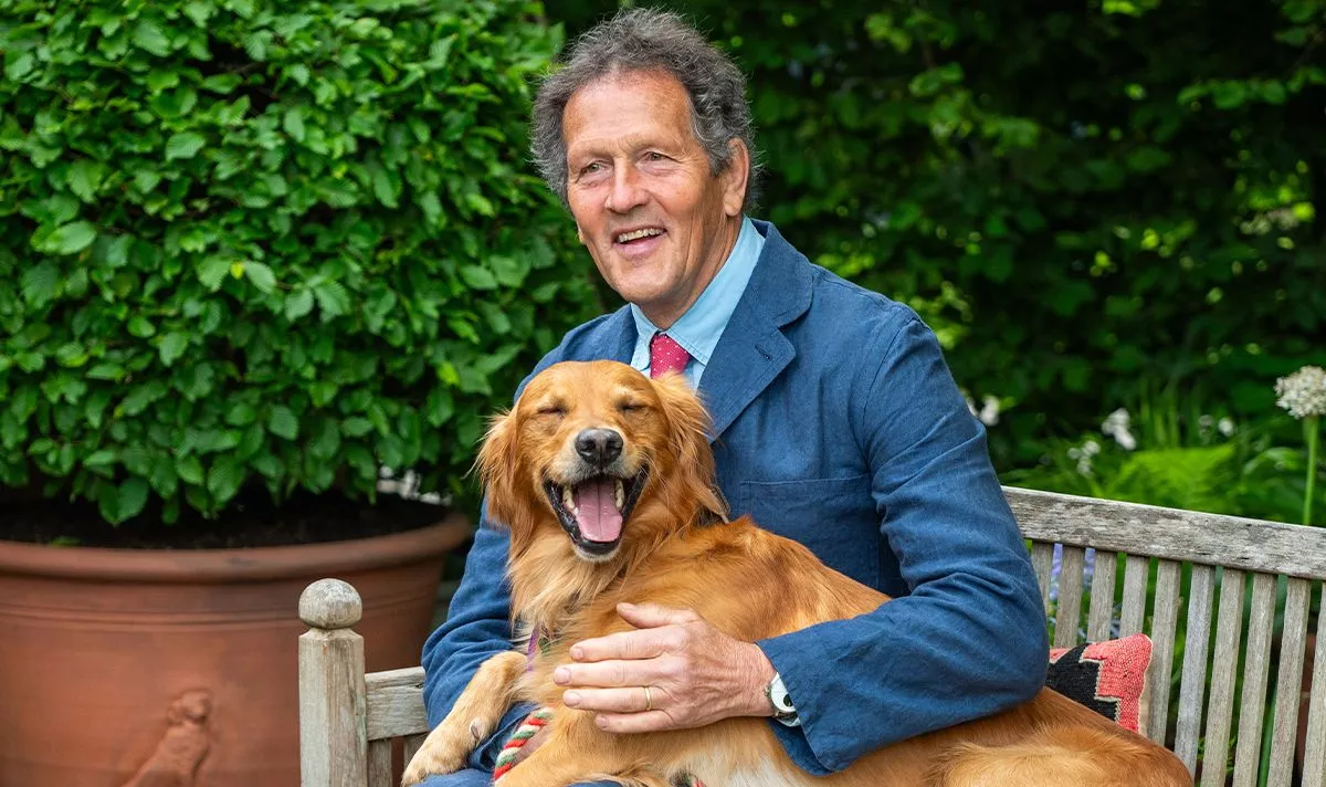 Gardening expert Monty Don with a dog