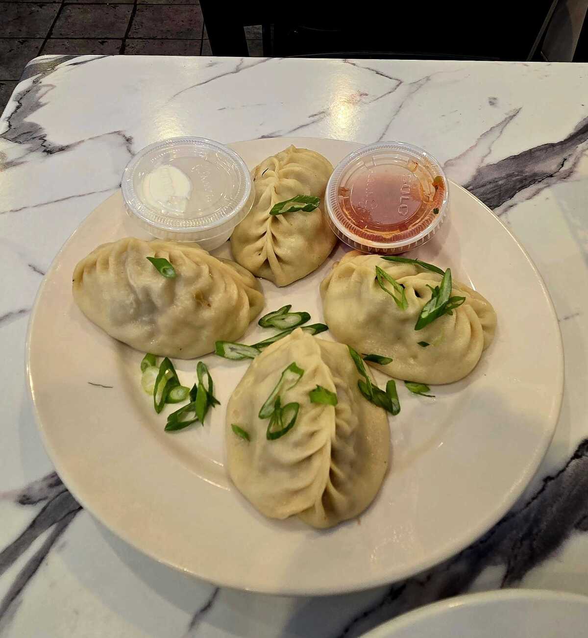 Manty: Steamed dumplings stuffed with diced lamb and onions