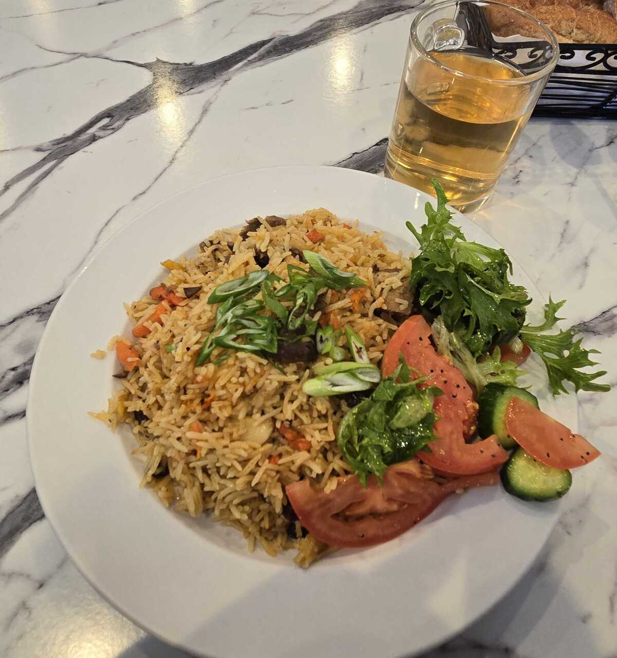 Plov: Seasoned rice with lamb.