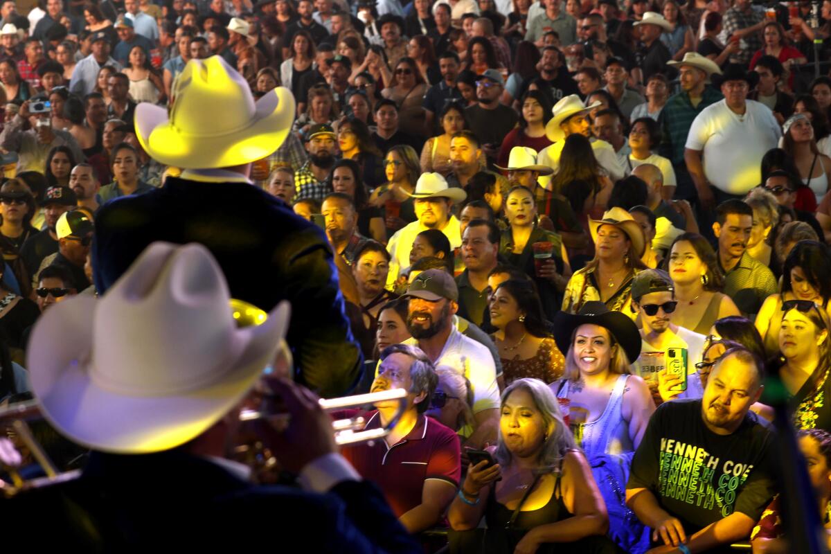 Hundreds enjoy a performance by Banda Los Lagos during Jalisco Fest at the 2025 Santa Fe Springs Swap Meet.