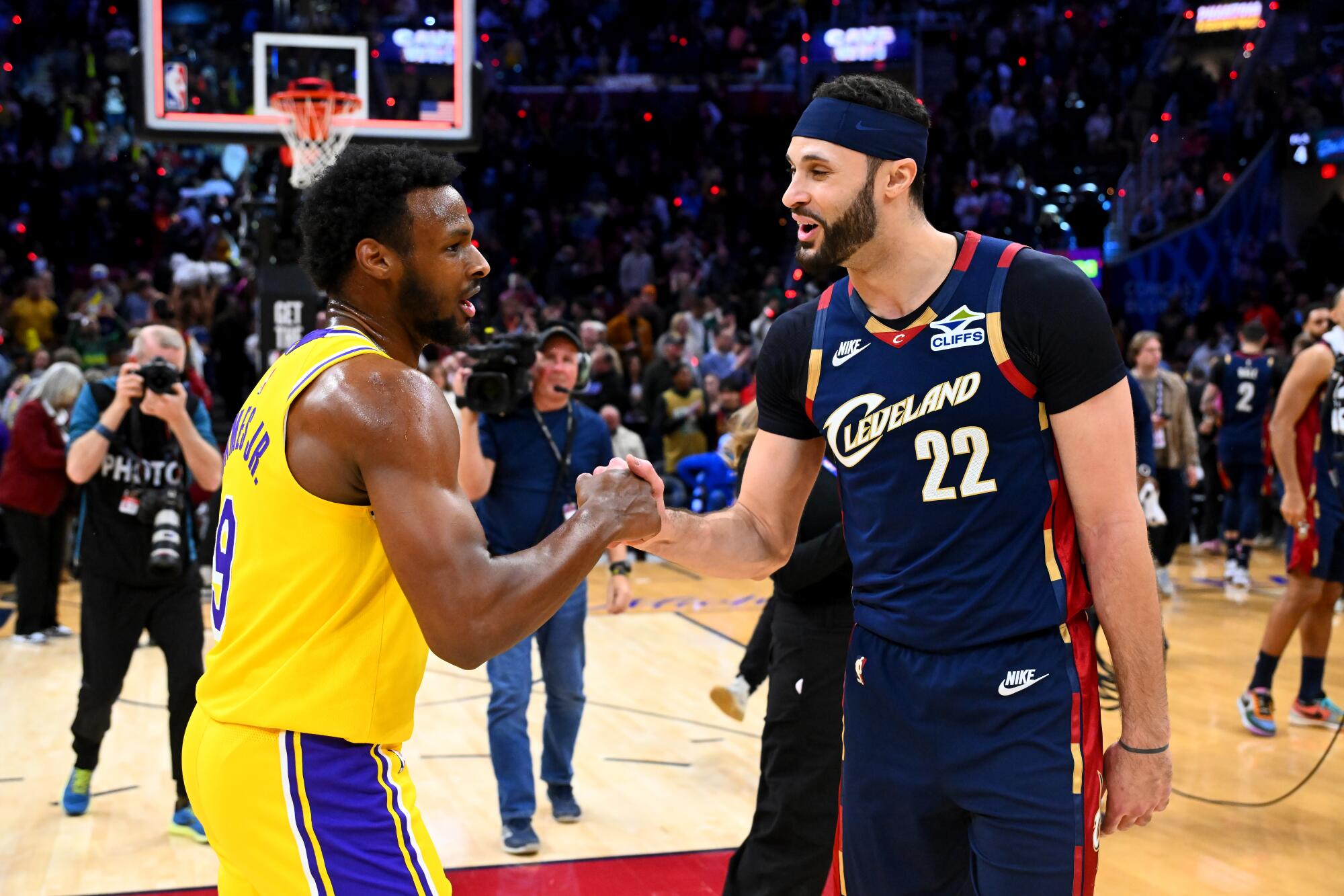 Laker Bronny James #9 of the Los Angeles Lakers shakes hands with the Cavliers' Larry Nance Jr. Wednesday.