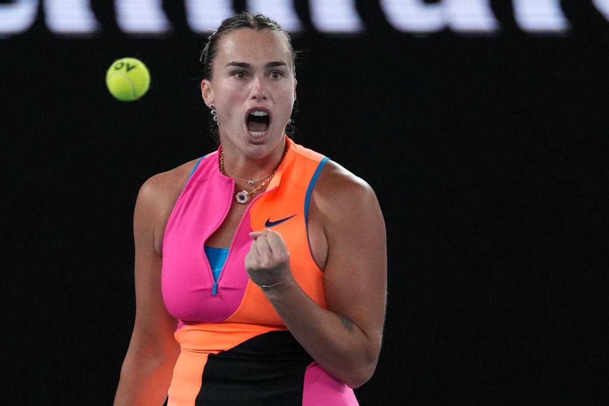 Aryna Sabalenka pumps her left fist and lets out a yell after winning a point in the Australian Open women's final Saturday.