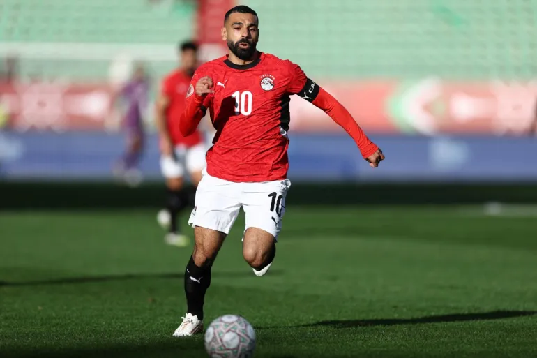 Egypt's forward #10 Mohamed Salah controls the ball during the Africa Cup of Nations (CAN) round of 16 football match between Egypt and Benin at the Grand Stadium in Agadir on January 5, 2026. (Photo by FRANCK FIFE / AFP)