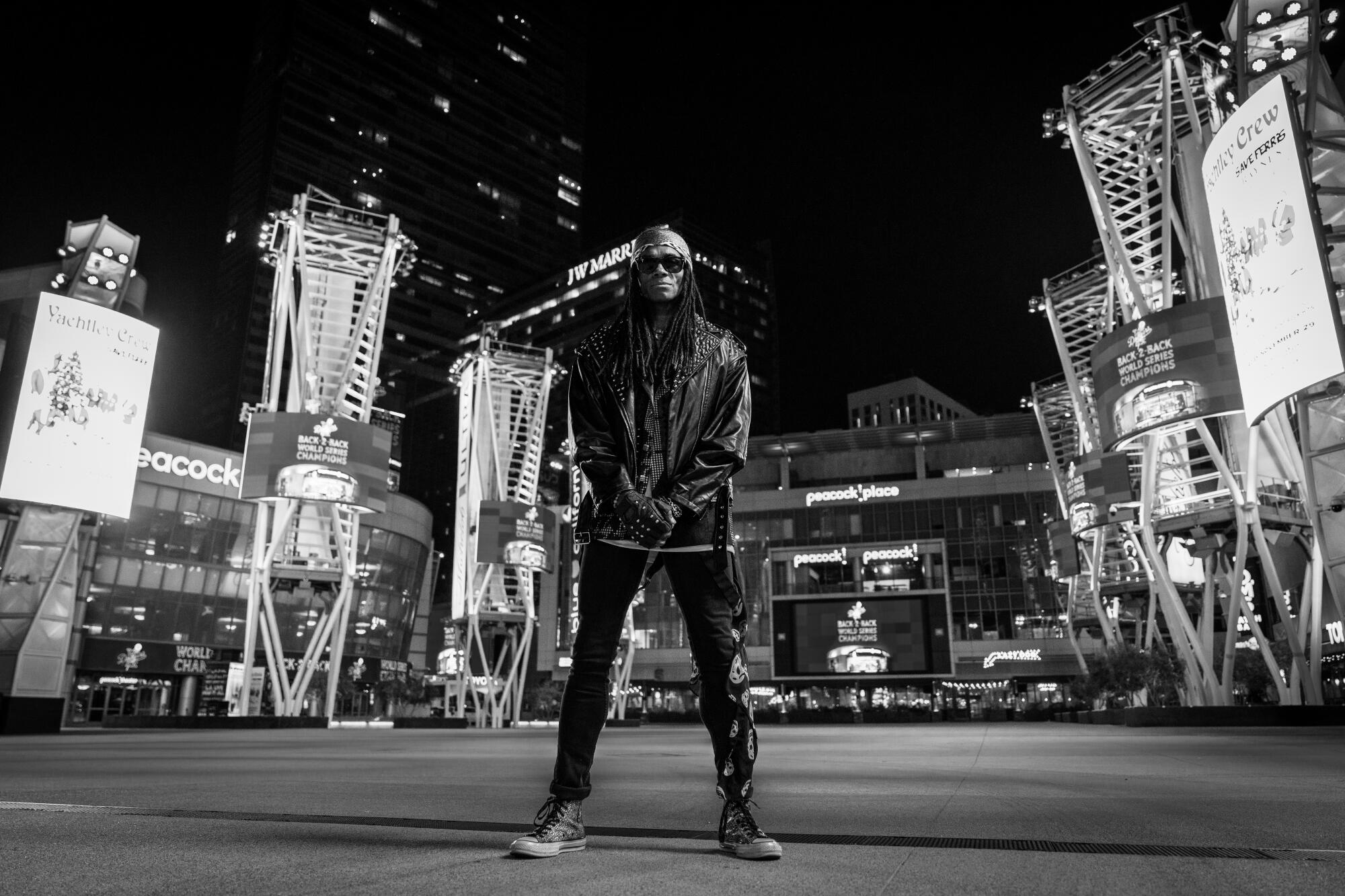 Man standing in front of a cityscape