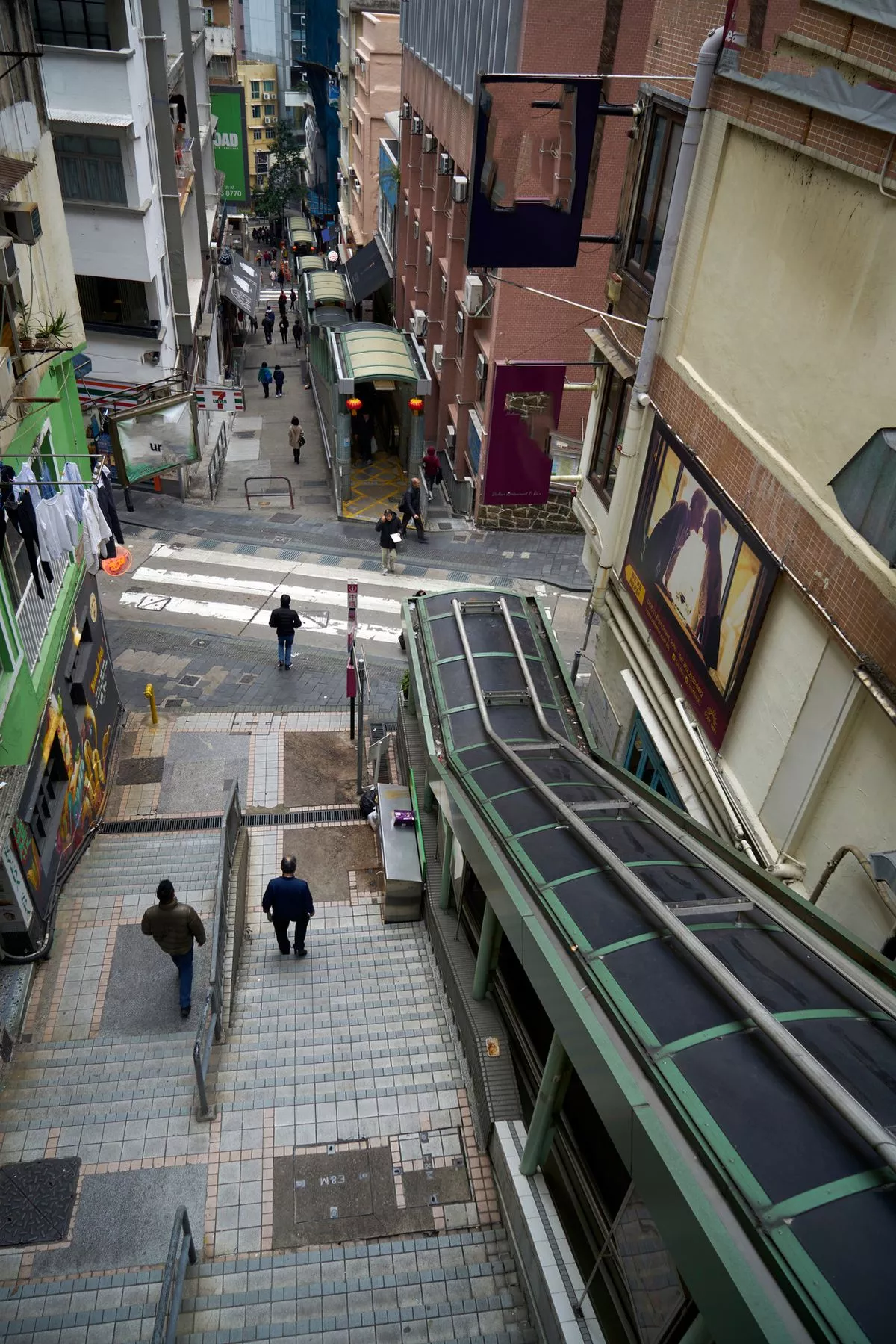 The Central Mid-Levels Escalator system, Hong Kong; This is the world's longest outdoor covered escalator system, stretching for over 800-metres and rising 135-metres through the streets of a steep hillside linking these districts of Hong Kong Island.