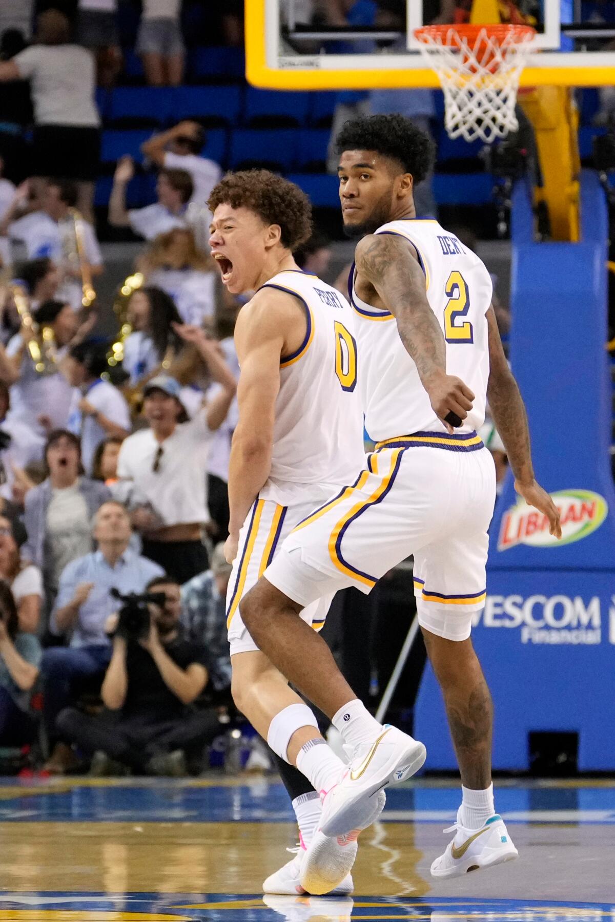 UCLA guard Trent Perry celebrates one of his big shots against Indiana. He led the Bruins with 25 points.