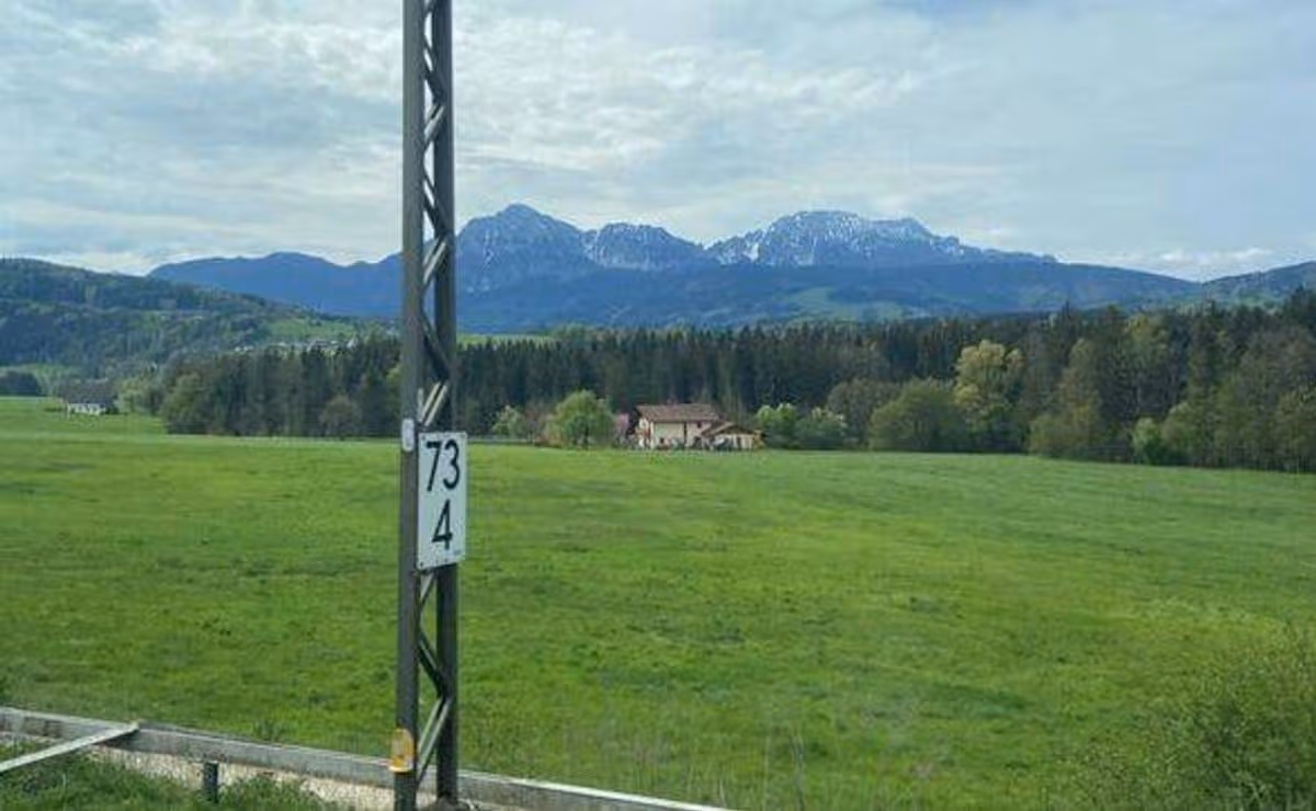 View of German mountains from nearby train tracks.