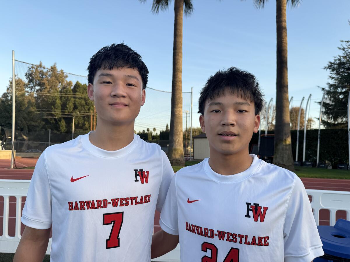 The Chen brothers, JT (left), a sophomore, and Ollie, a freshman, are top soccer players.